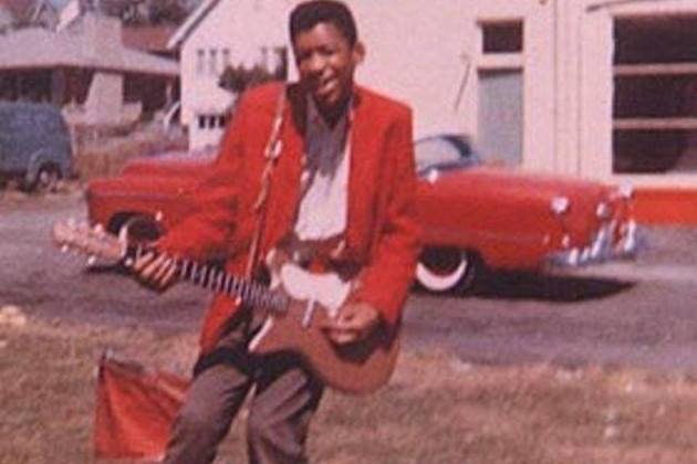 Young Jimi Hendrix with his first guitar. Jimi Hendrix Definitive Story