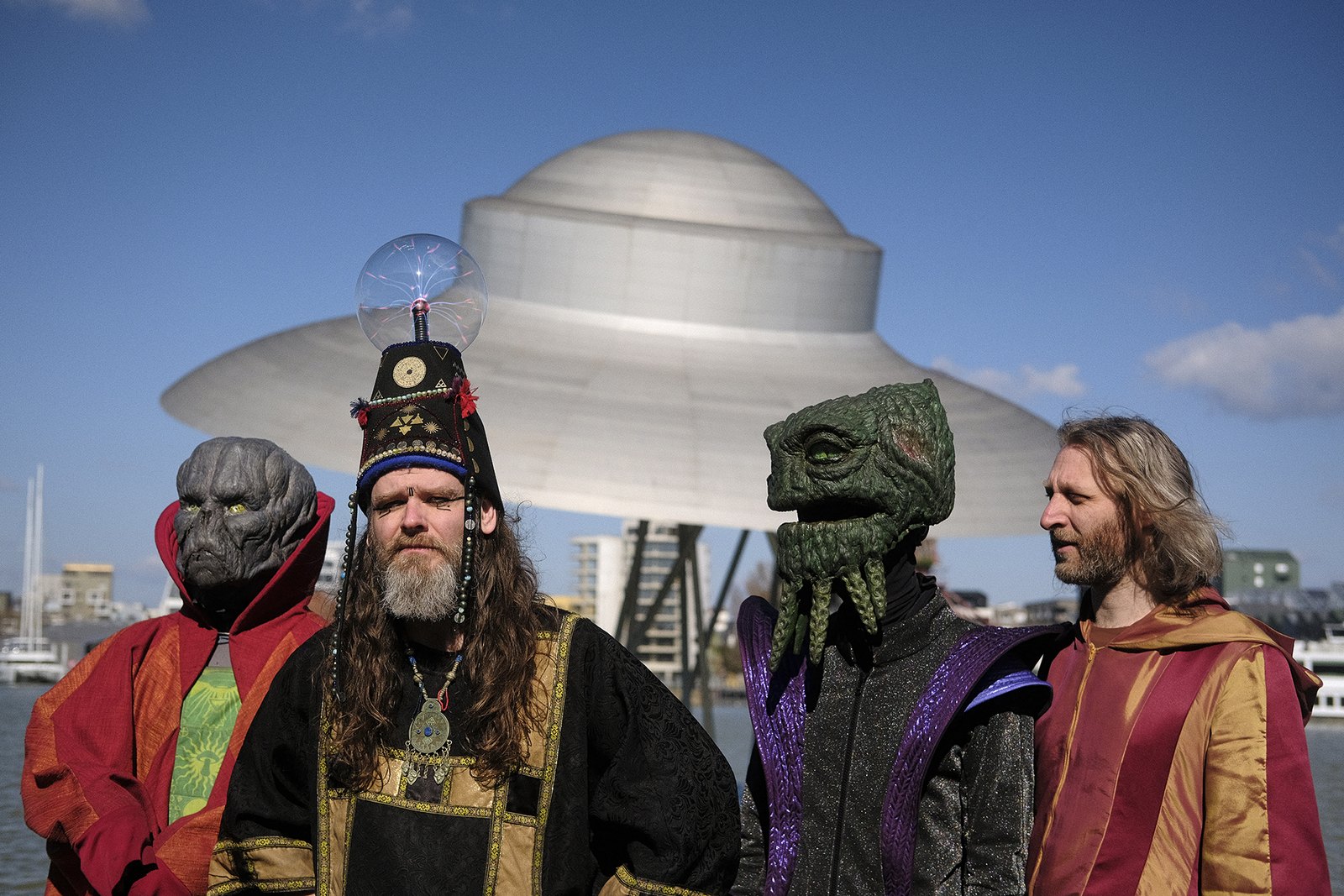 HENGE front creature Zpor with the band in 2025